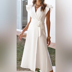 Amalie the label 100% linen size US 4 used 
White linen wrap dress